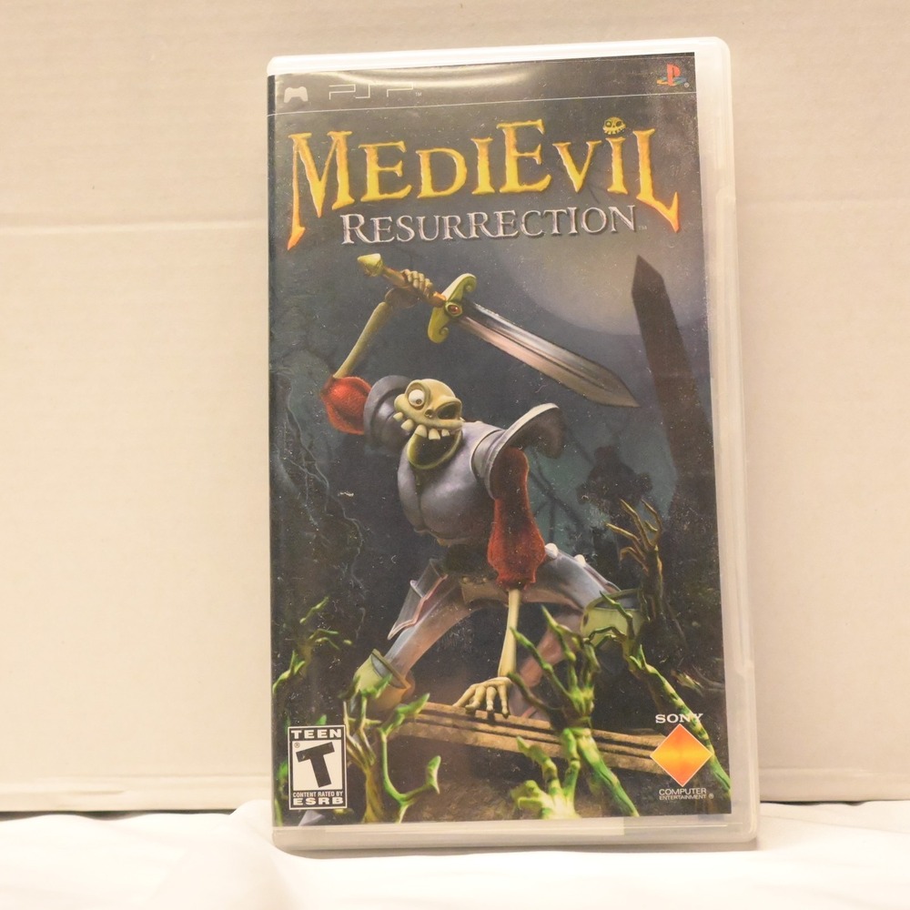 MediEvil Resurrection CIB Sony PSP Complete w/ Case Manual PSU Registation Card